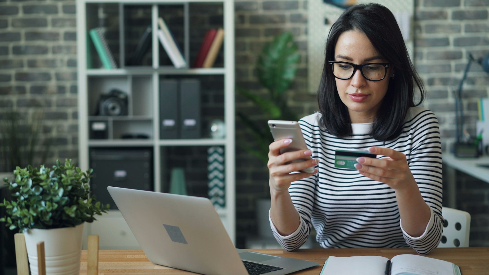Customer making a secure online payment by smartphone