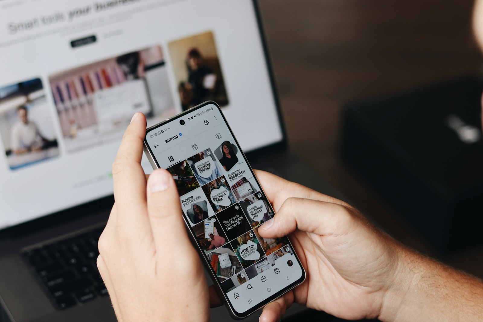Smartphone and laptop used for social media content planning
